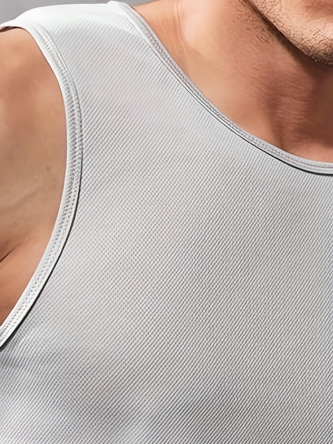 Camiseta gym hombre blanca sin mangas