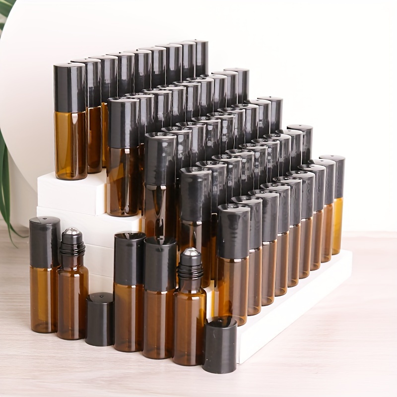 

50pcs Amber Glass Roller Bottles, 5ml/10ml Mini Refillable Perfume Sample Vials, Portable Travel Size, Essential Oils, Aromatherapy, With Roller Balls & Black Caps
