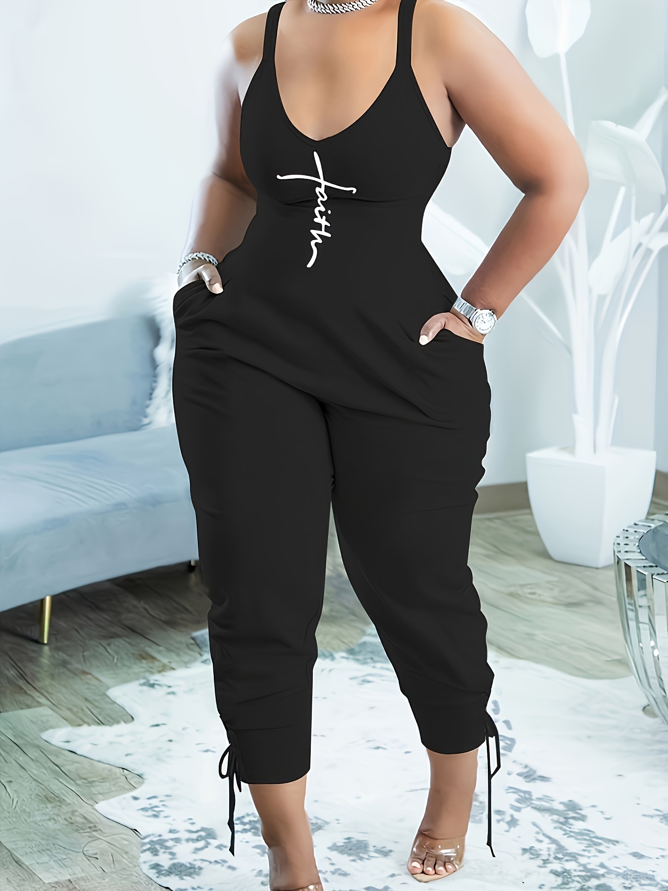 This plus size, stretch knit jumpsuit features an all over fishnet mesh, a  v-neckline with adjustable straps, a waist panel, and a curve-hugging  silhouette …