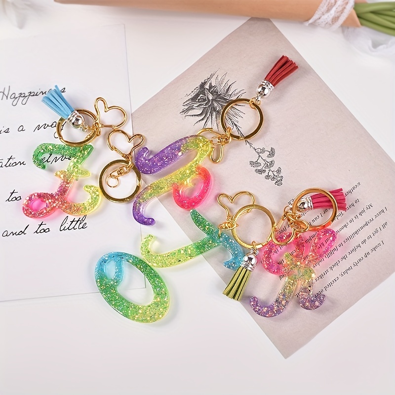 Letter Keychain With Sprinkles and Tassels -   Resin jewelry diy,  Resin crafts, Diy resin crafts