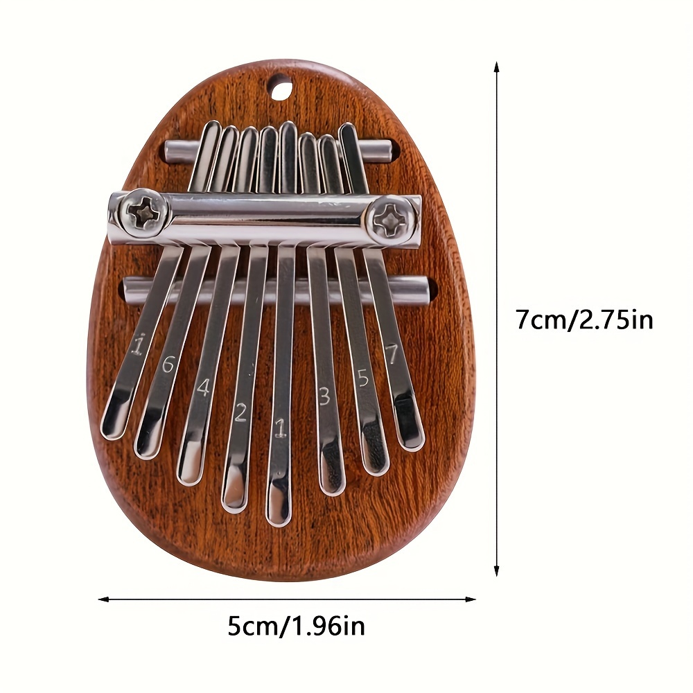 Bakodiu Kalimba Finger Pianoforte Gadget con cordino portatile Pollice  Pianoforte per Adulti Bambini Principianti - Marimbas Strumento Musicale  Suoni Meravigliosi Musica Professionale Ciondolo Regalo : :  Strumenti Musicali