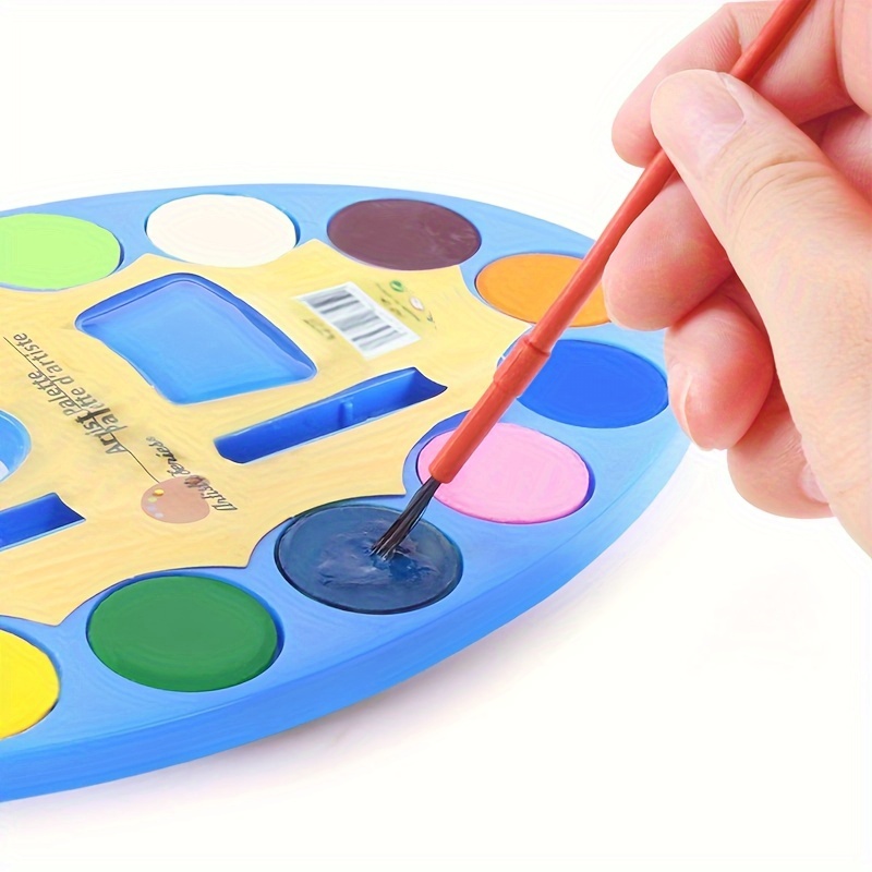 PALETTE OF 12 GOUACHE PAINTS