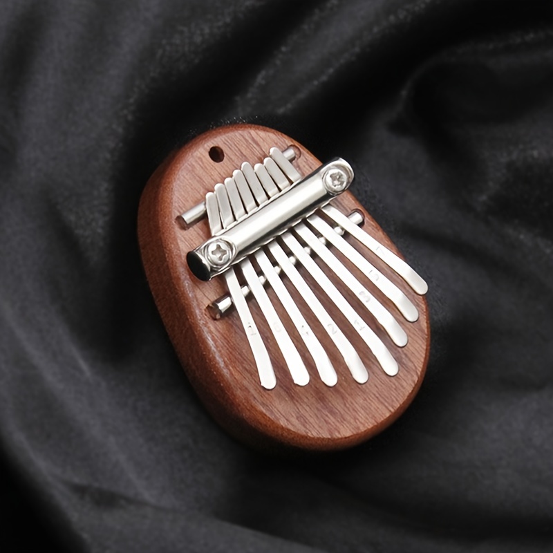 

8 Keys Mini Kalimba Finger Thumb Piano Marimba Music Gift For Beginners Music Lovers Players Eid Al-adha Mubarak
