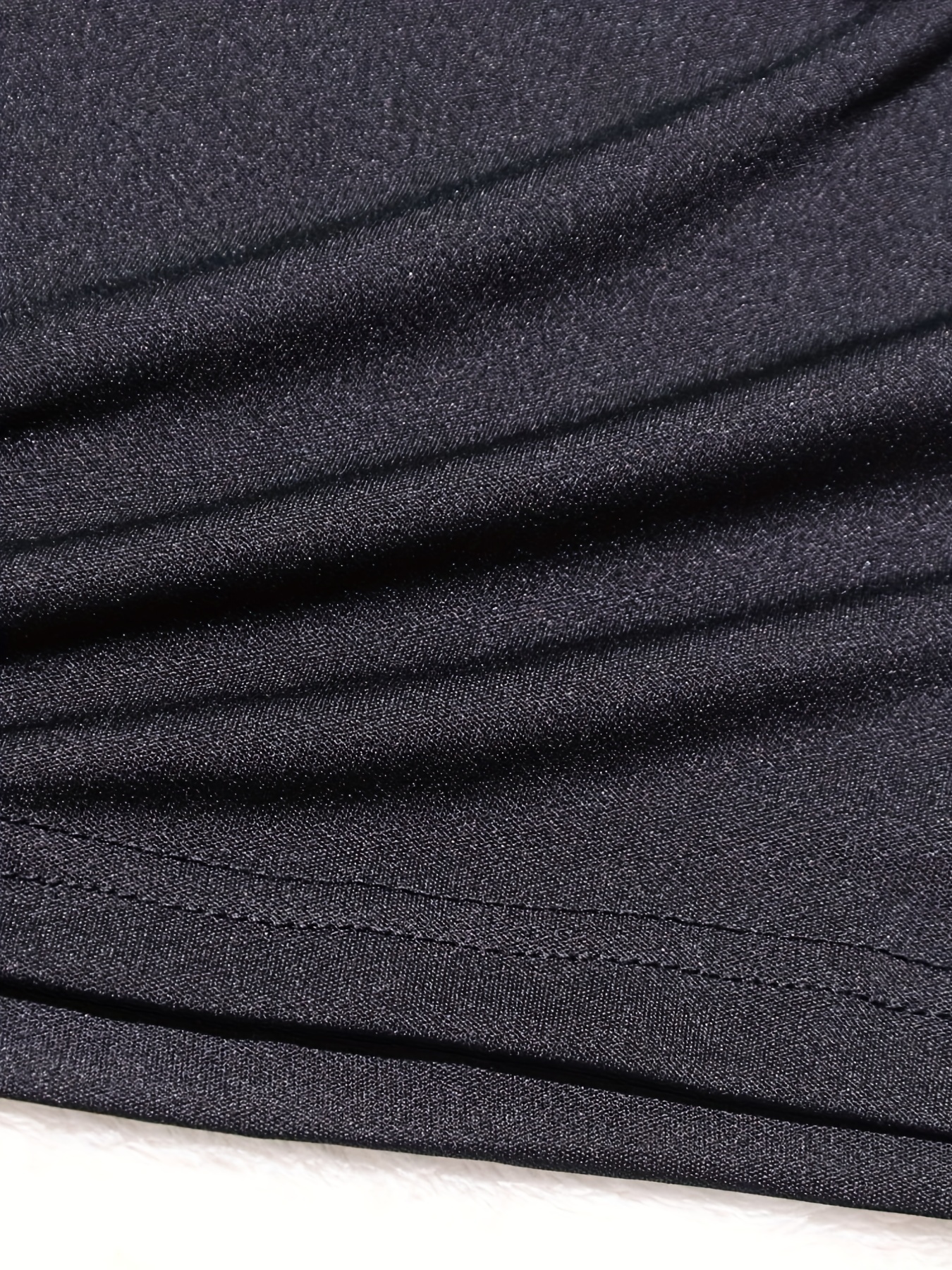 Jersey/Stretch Fabric Black Leopard Print on Grey Background