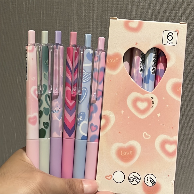 Image of 6pcs Black Heart-shaped 0.5mm Gel Pens, High Aesthetic Minimalist Girly Click Pens, Black Quick- St Tip Carbon Ink Pens