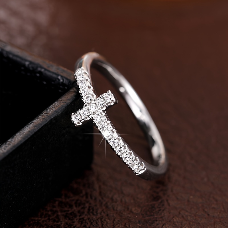 A Stylish And Minimalist Cross Ring for Women Featuring Micro-Set Zirconia Stones Perfect for Daily Wear Casual Parties Engagements Weddings And As a Commitment Gift