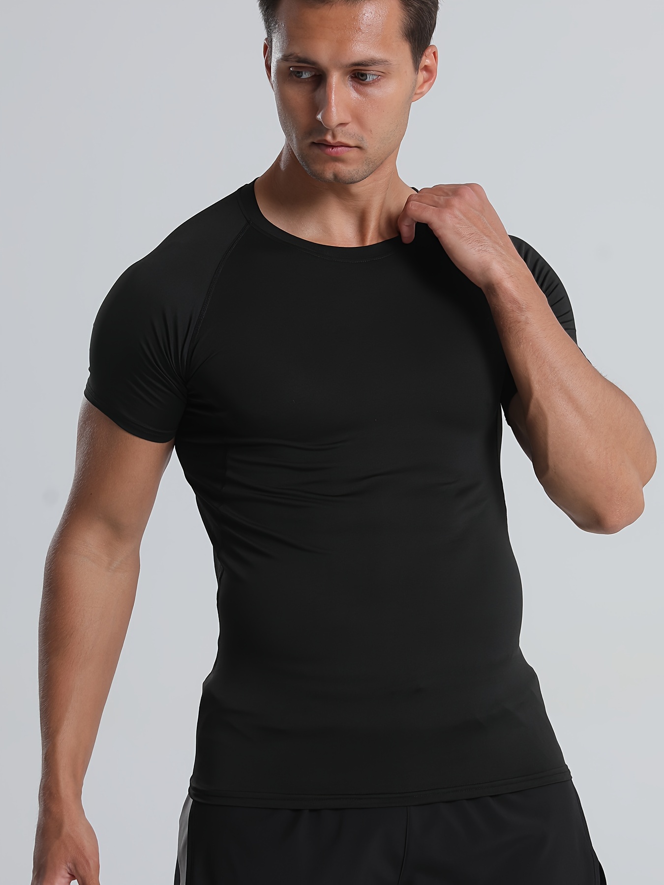 Camisetas negras de compresión para hombre, de manga corta