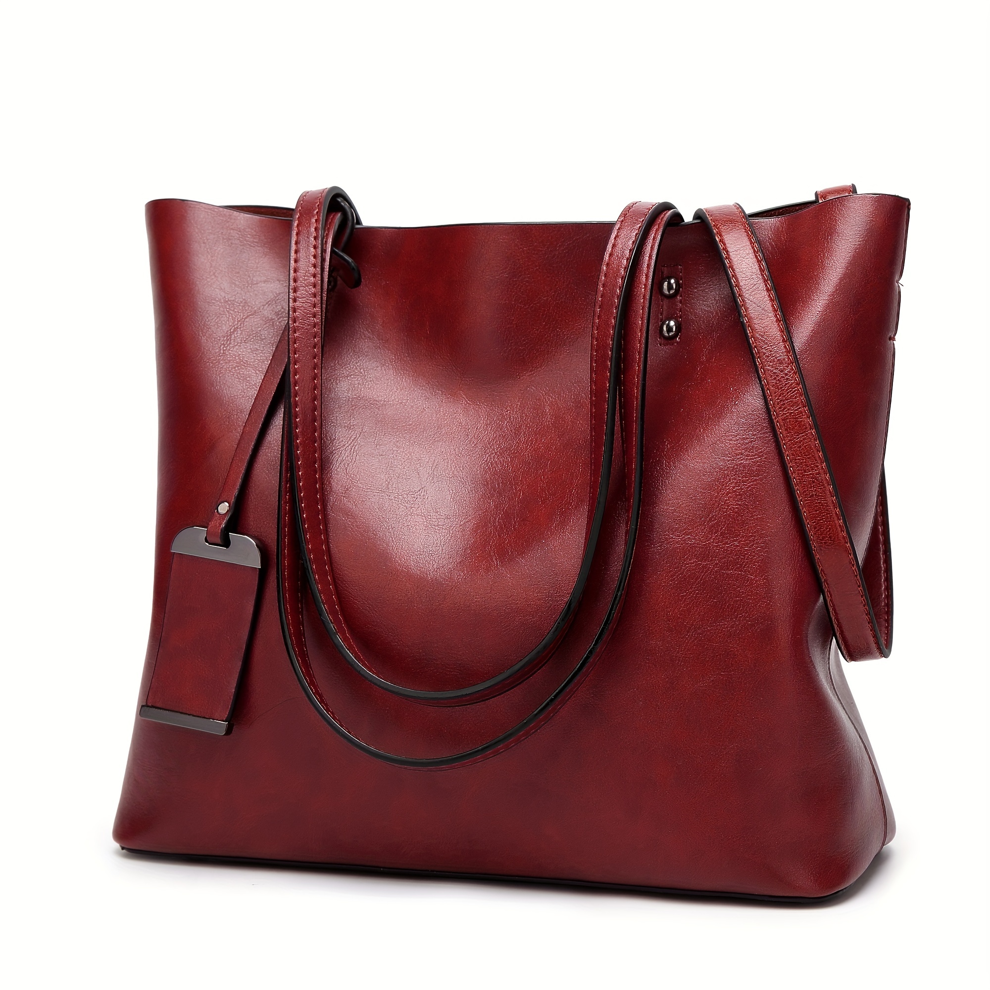 TappooCity - Shopping, Food, Fun & Entertainment for the Entire Family - A  larger-than-life essential, this faux-leather tote bag features dual  shoulder straps and an all over logo print with contrasting stripe