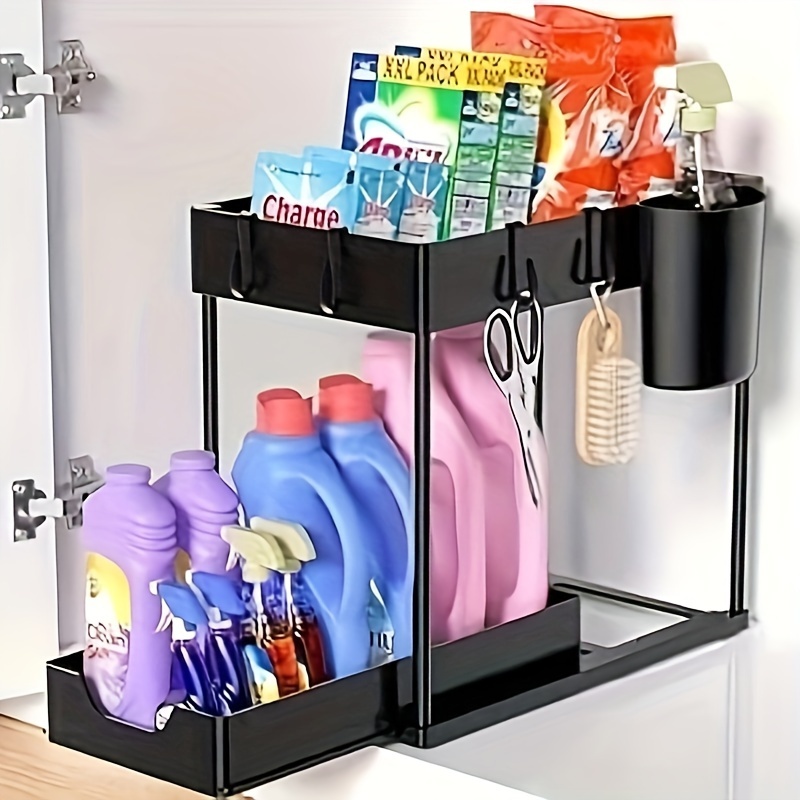 And stick adhesive hooks under your kitchen sink to hang the
