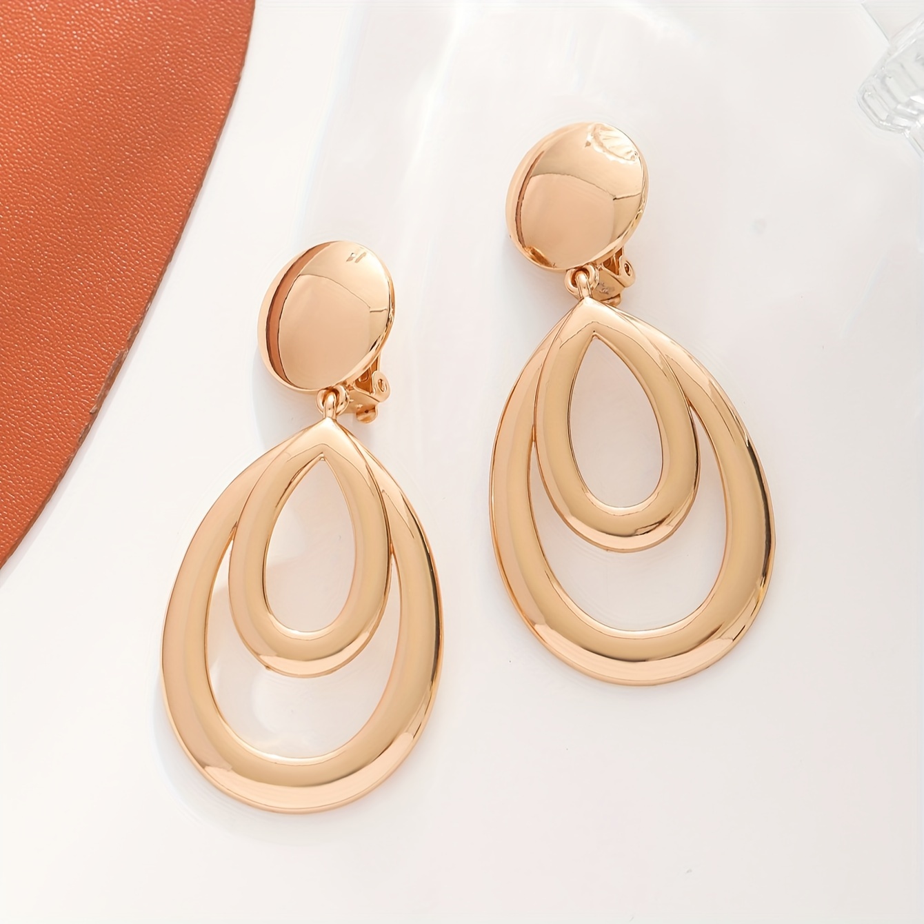 Image of 1 Pair Of Metal Wind Exaggerated Fashion Ear Clip-on Hypoallergenic Hollow Water Drop High-quality Earrings Suitable For Women' And Prom Party Wear