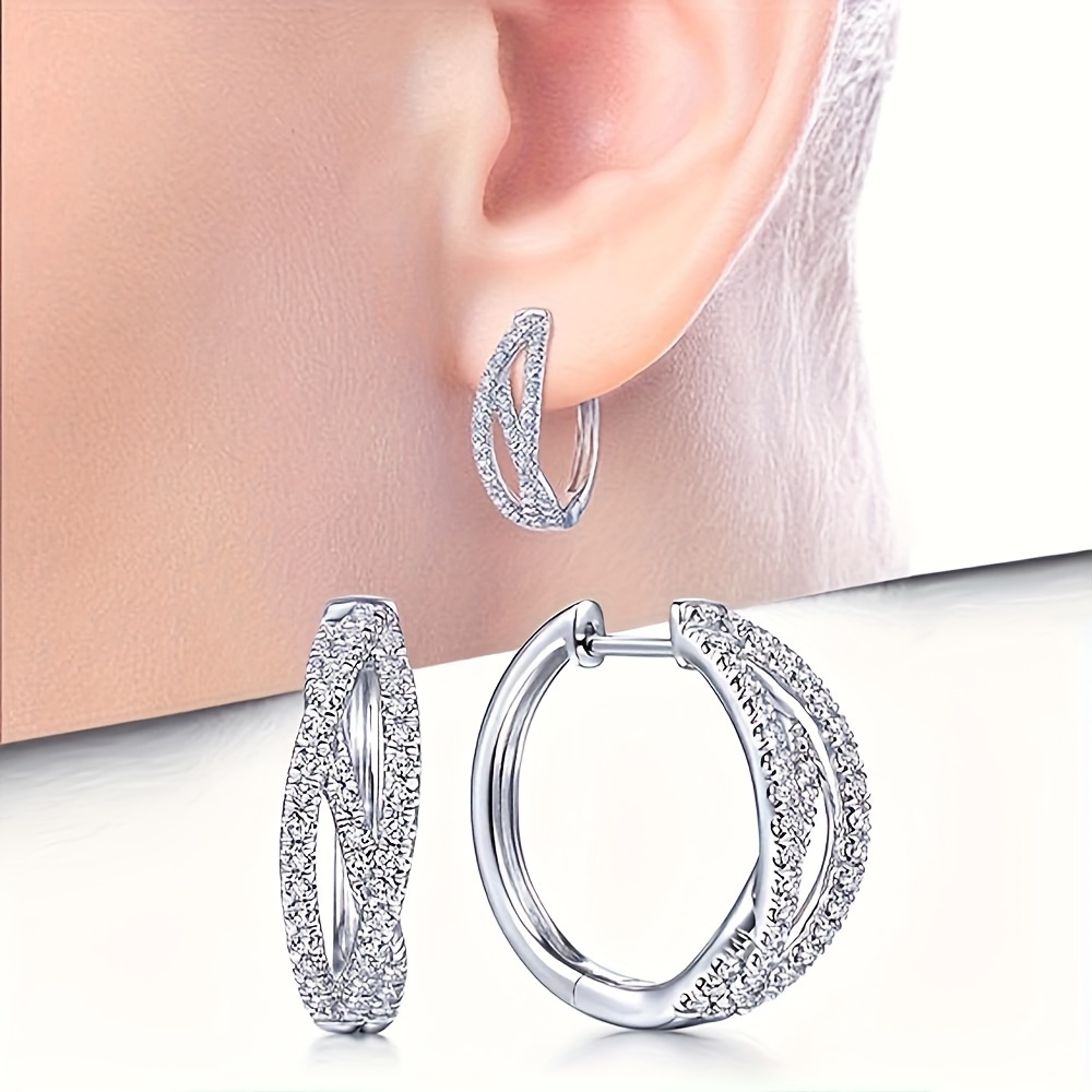 

Boucles d'oreilles créoles exquises en cuivre plaqué argent, ornées de zircones, style simple et élégant, cadeau tendance pour femme.