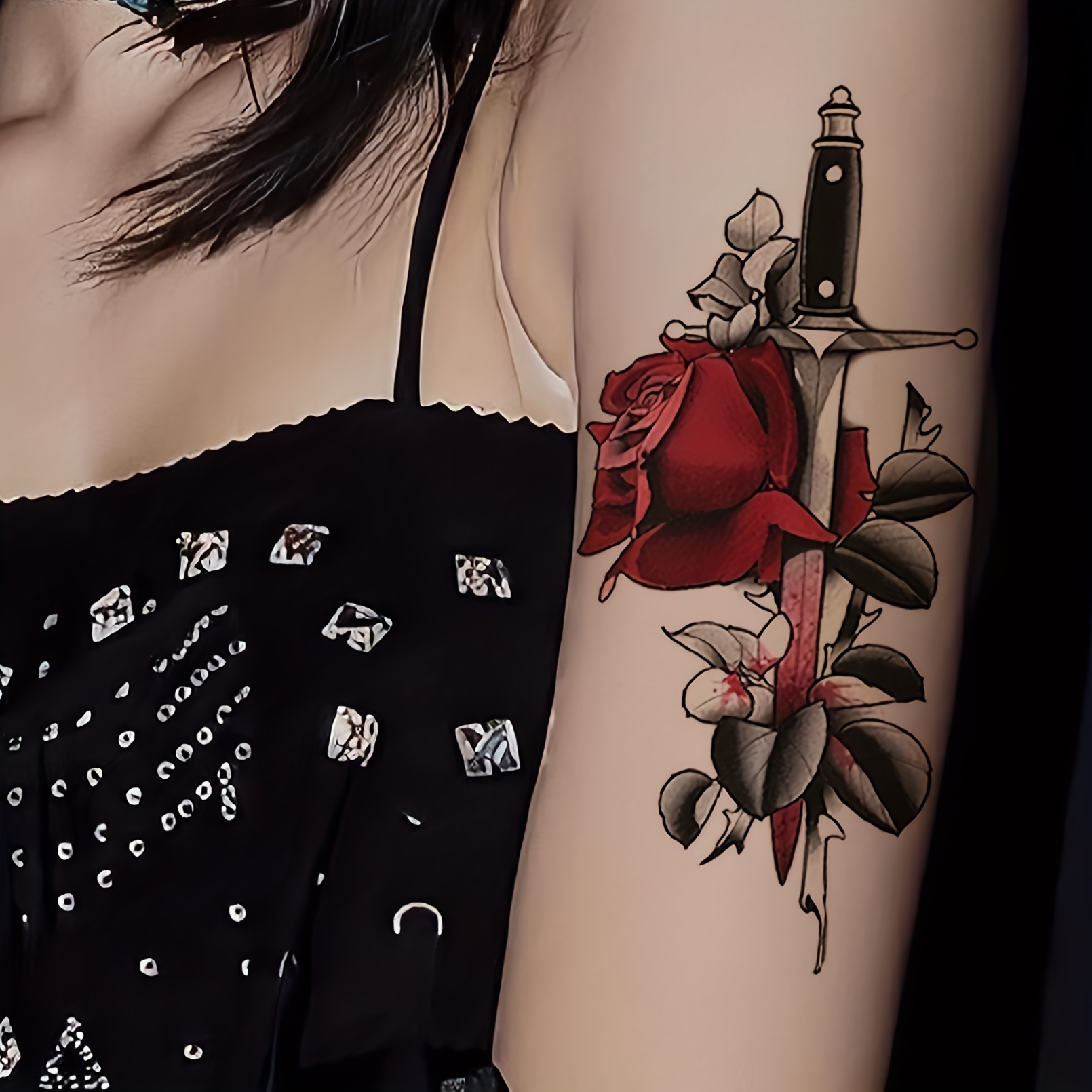 skull and roses shoulder tattoo