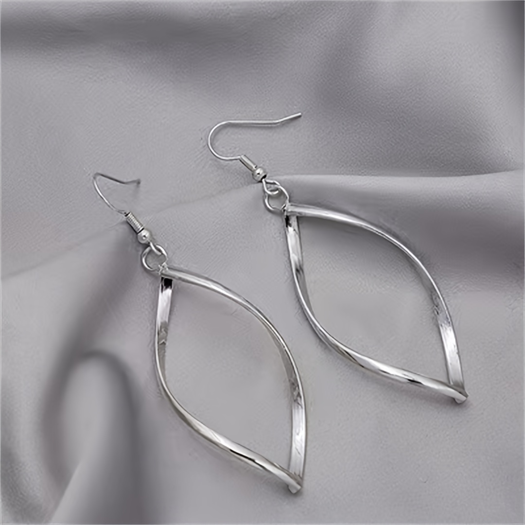 Bold Twisted Wave Dangle Earrings for Parties