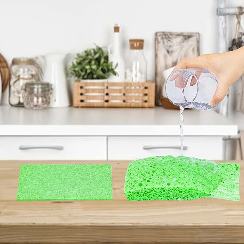 Premium Photo  Dish washing sponge, dishcloth and scrub pad on wooden  background