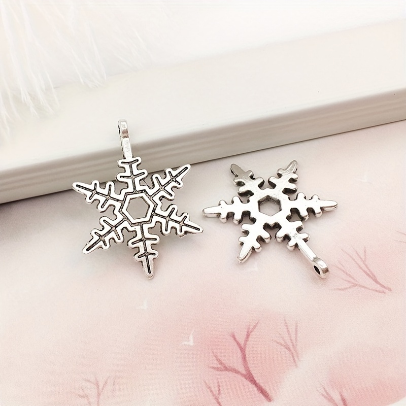 Snowflake Charm-100g (About 80-90pcs) Antique Silver Christmas Snowflake Charms Pendants for Crafting, Jewelry Findings Making Accessory for DIY