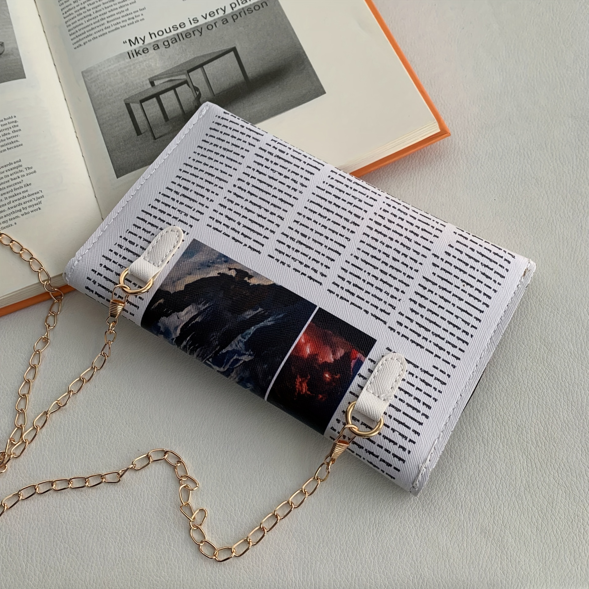 Newspaper clutch online bag