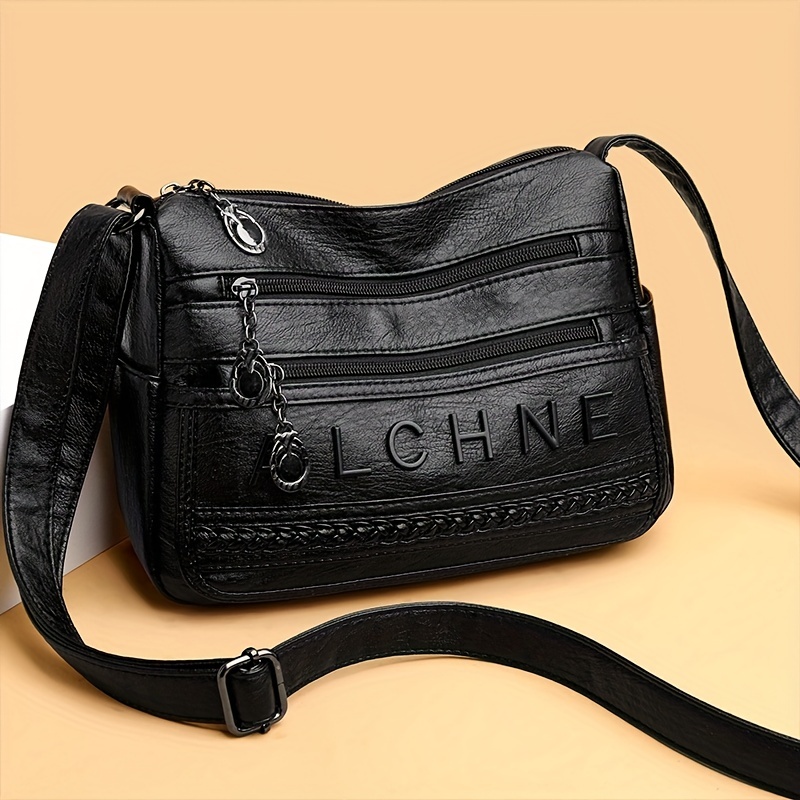 Letter printed fashionable handbag with adjustable shoulder straps