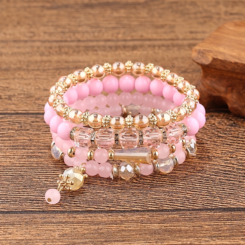 Gold Tone Pink, Green, and White Beaded Set of 14 Stretch Bracelets -  OPC1067