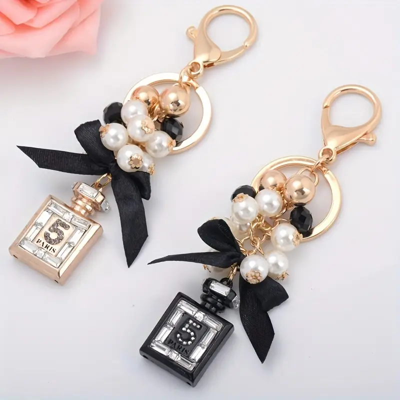 PERFUME & PEARL BAG CHARM W/ROSE BOW PERFUME & PEARL BAG CHARM W/ROSE BOW