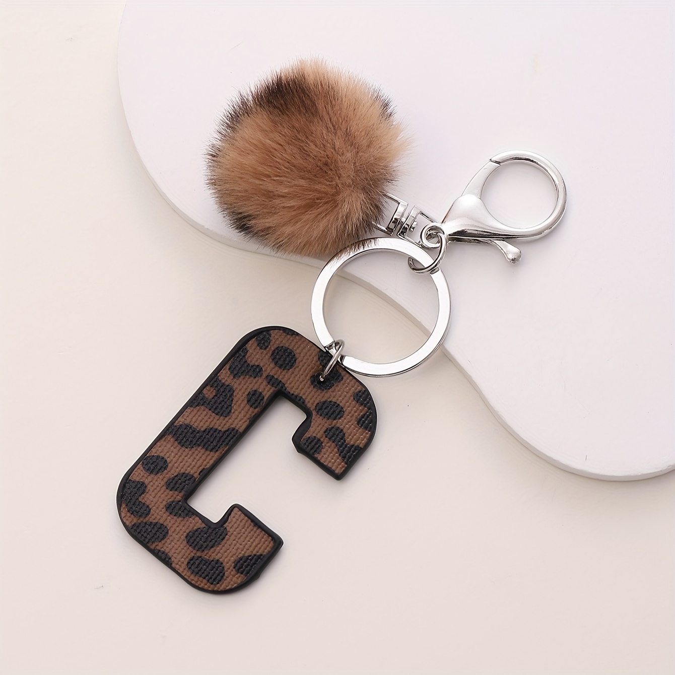 Initial pom pom on sale keyring