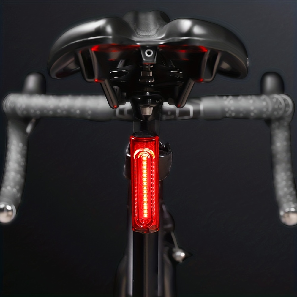  KEYWELL Luz trasera de bicicleta recargable por USB, luz  trasera LED súper brillante con potente luz trasera roja para linterna de  seguridad de ciclismo, resistente al agua : Deportes y Actividades
