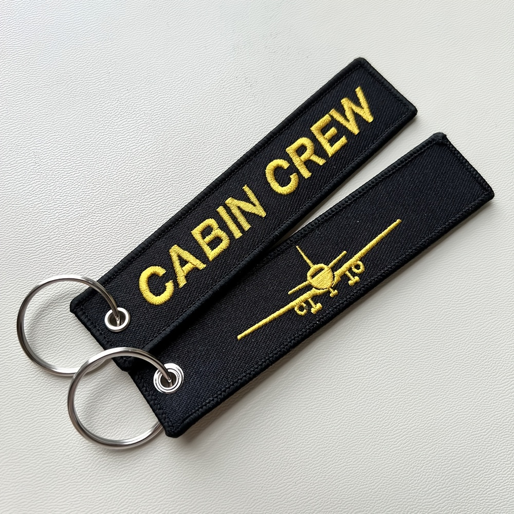 

1/2/5pcs Cabin Crew Keychain, Fashion Trinkets English Letters Golden Plane Pattern, Embroidery Key Ring Pendant For Men