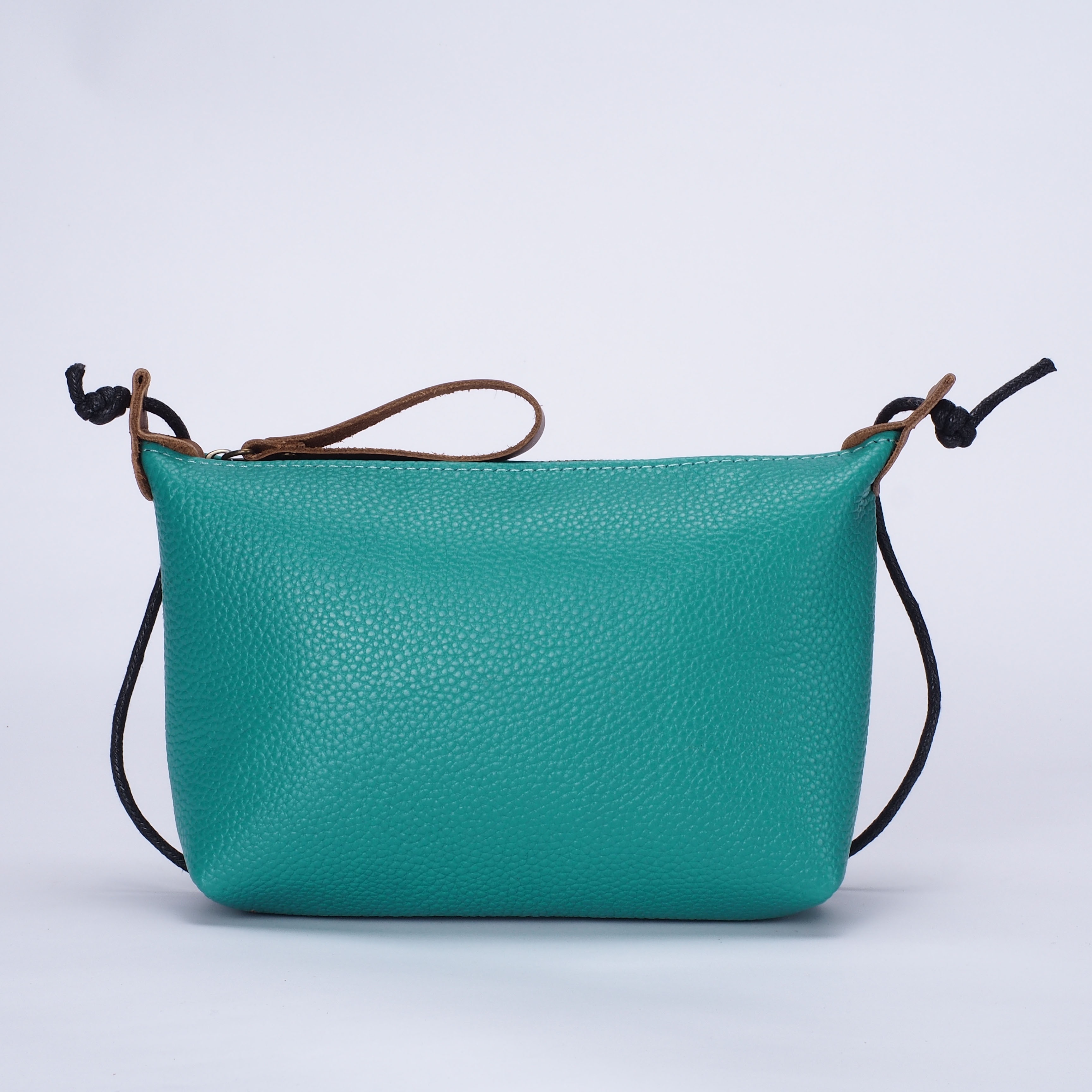 Small leather bag in TURQUOISE. Cross body / shoulder bag in