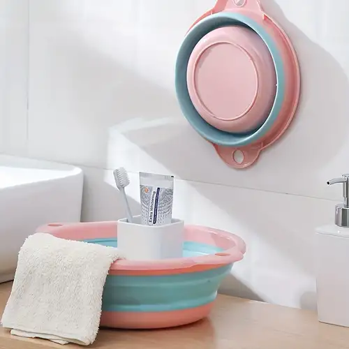  Nuby Cuna de baño antideslizante para bebé con bandeja de goteo  incorporada de doble uso (en bañera y encimera), color aguamarina : Bebés