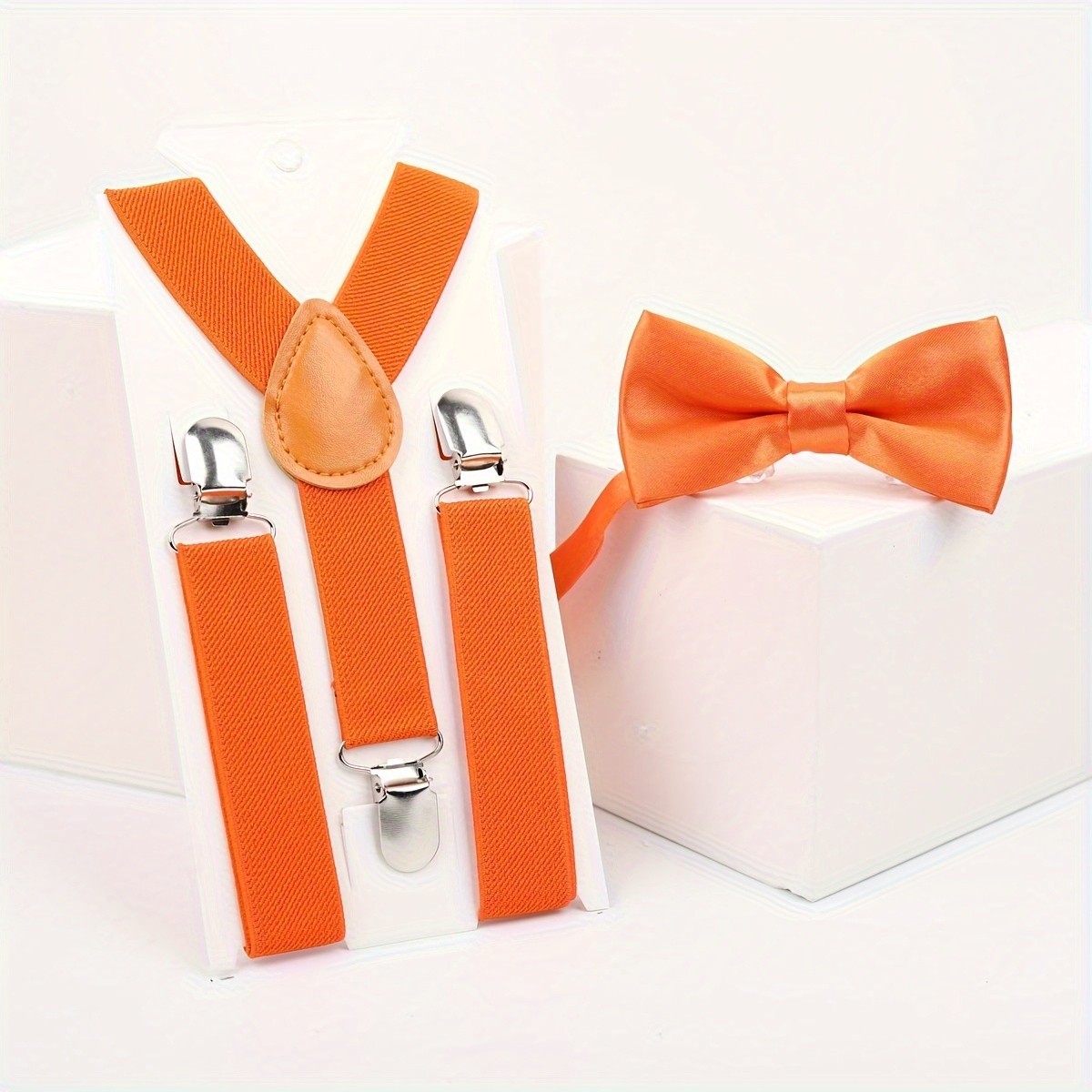 orange bow tie and braces