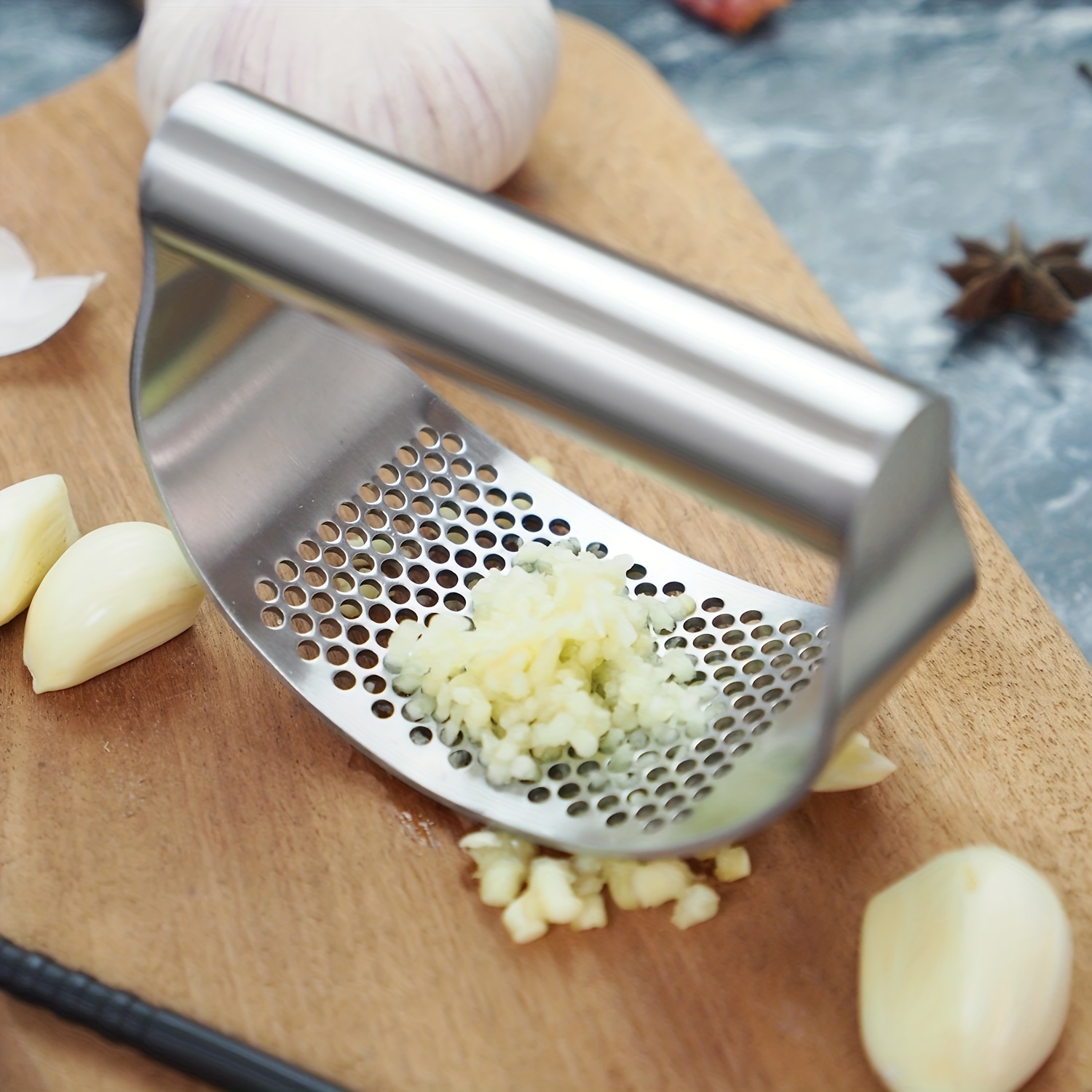 Stainless Steel Garlic Press with Arc-Shaped Design for Easy Mashing