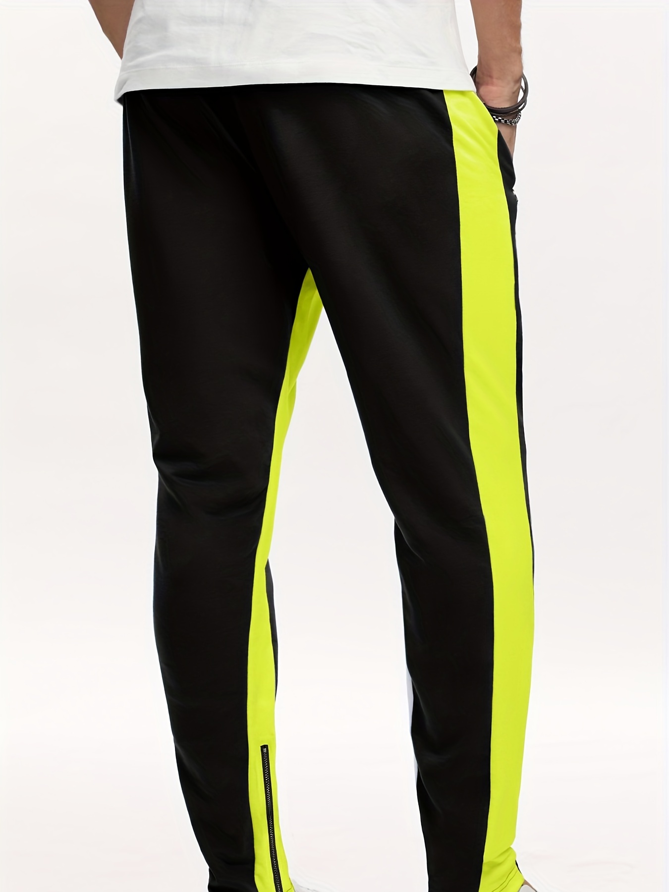 Men's green track pants with 2024 red stripe