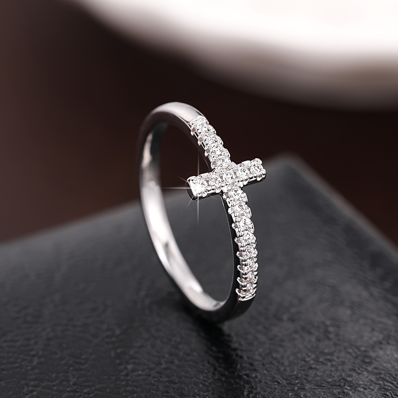 A Stylish And Minimalist Cross Ring for Women Featuring Micro-Set Zirconia Stones Perfect for Daily Wear Casual Parties Engagements Weddings And As a Commitment Gift