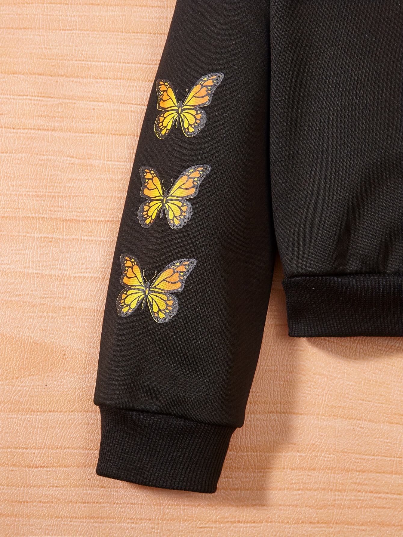 Butterfly and letter discount embroidered drop shoulder sweatshirt