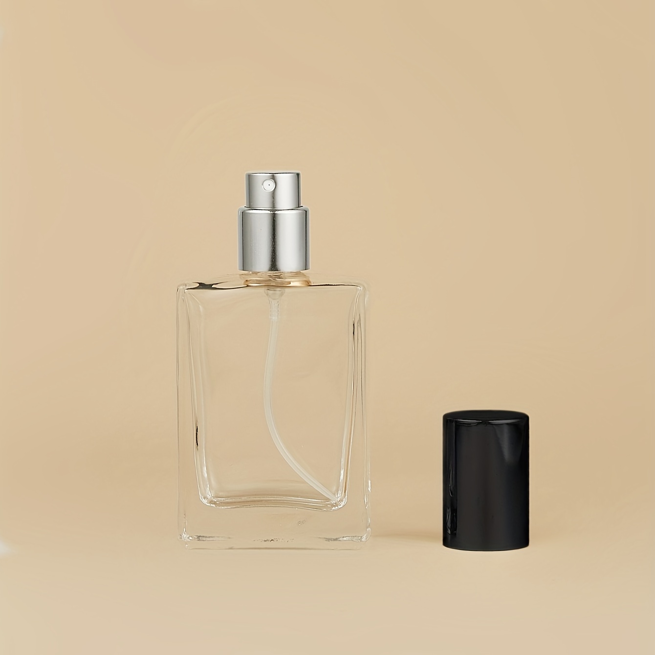 Flacons vaporisateur de parfum en verre transparent avec un