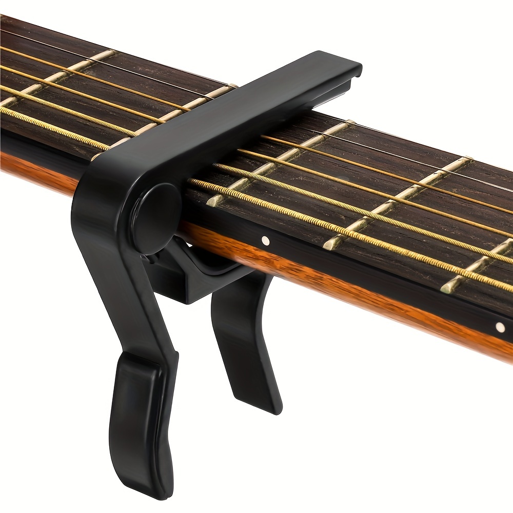 

Unlock Your Guitar's Potential: 6-string Acoustic & Electric Guitar, Bass, Mandolin & Ukulele Capo