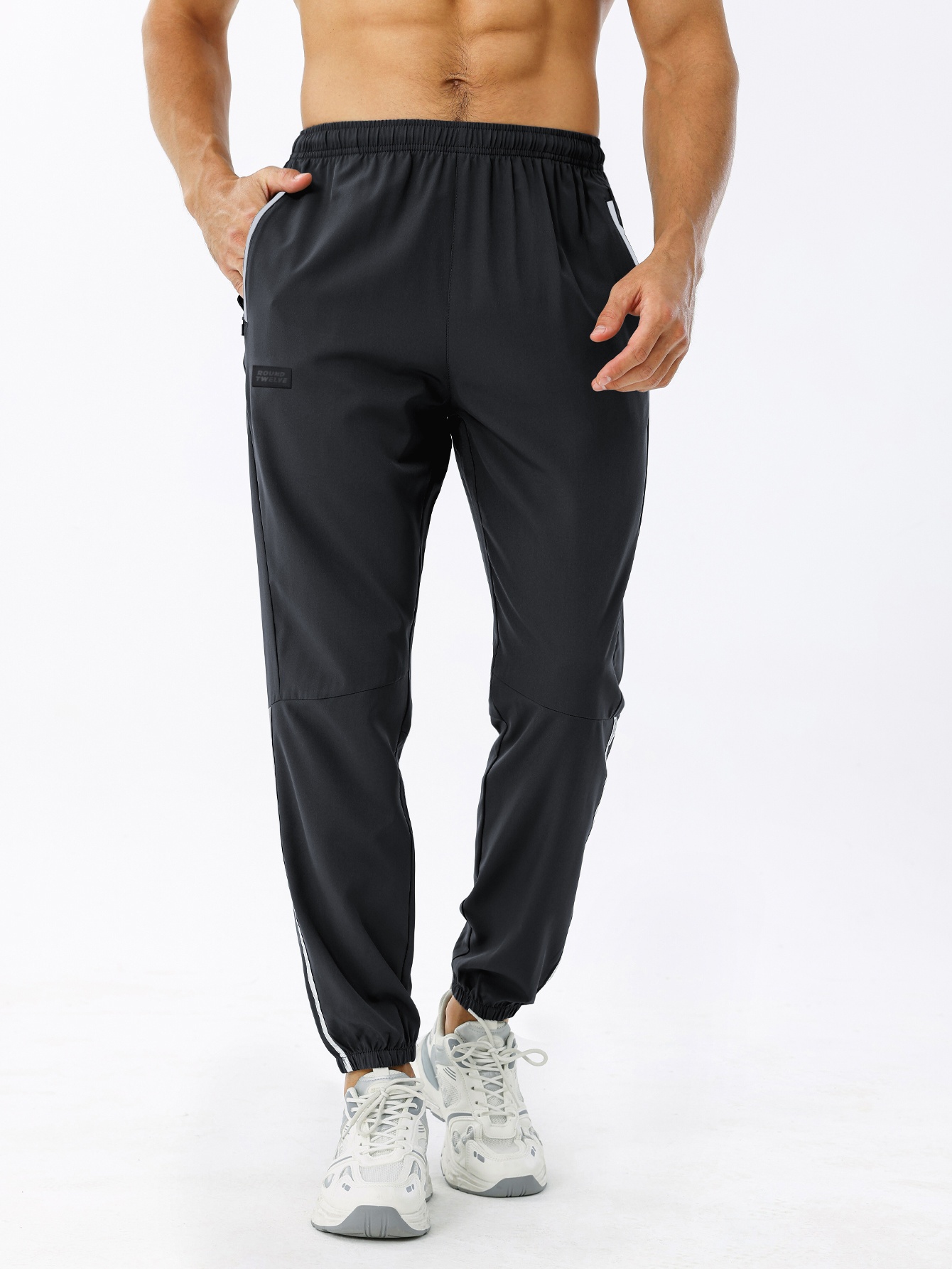 Training Essentials Woven Cuffed Pants in BLACK