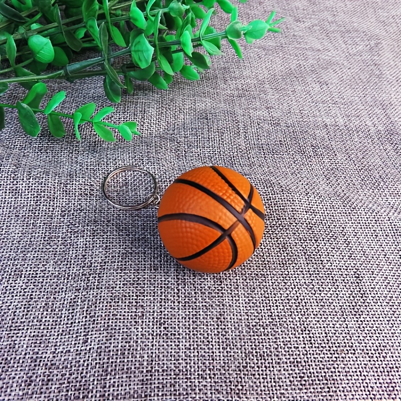 Porte-clés balle de basket en mousse argenté BIJOUX A OFFRIR | MATY