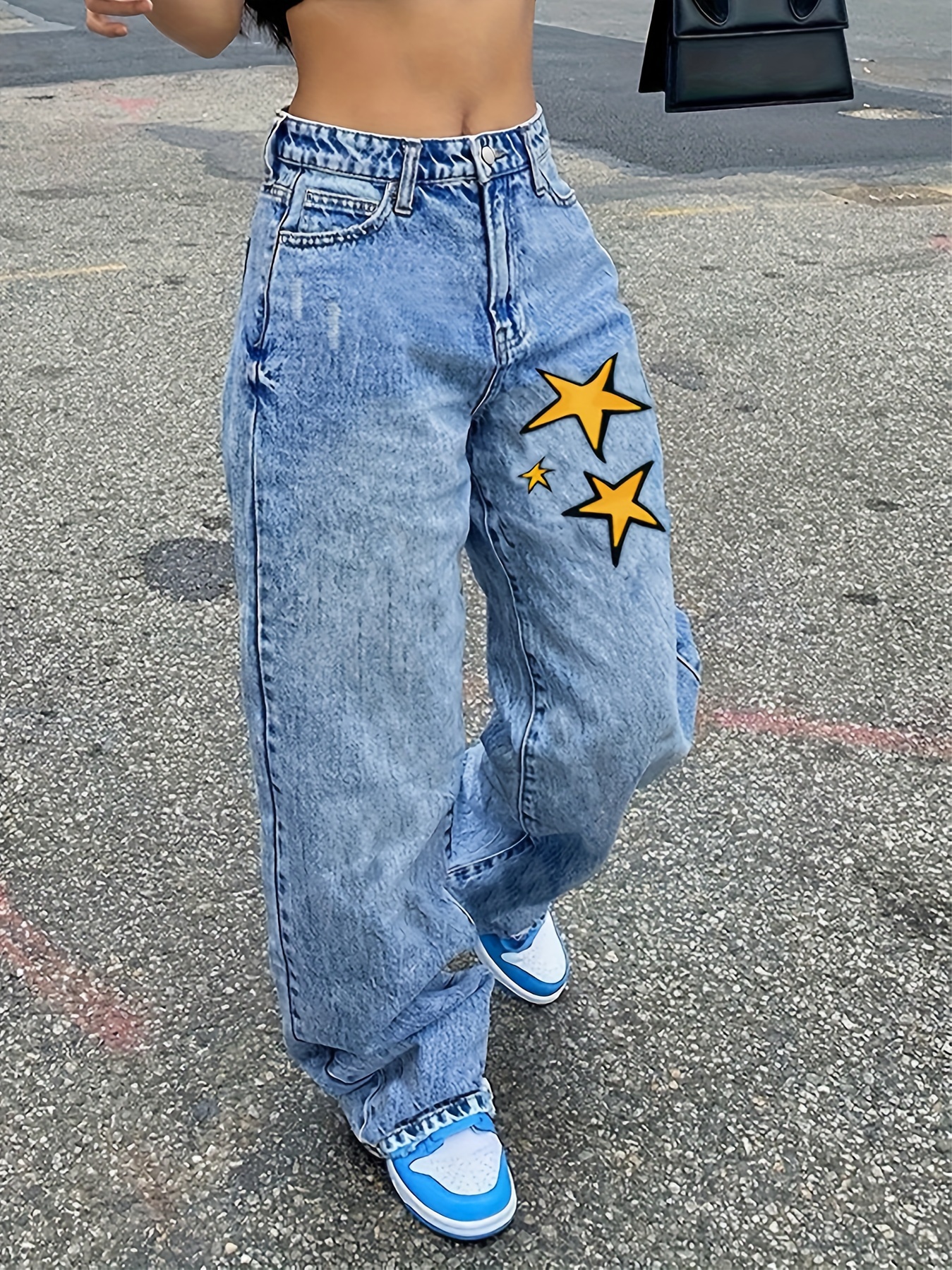Jeans Retos Lavados Com Estampa De Estrela Bolsos Inclinados