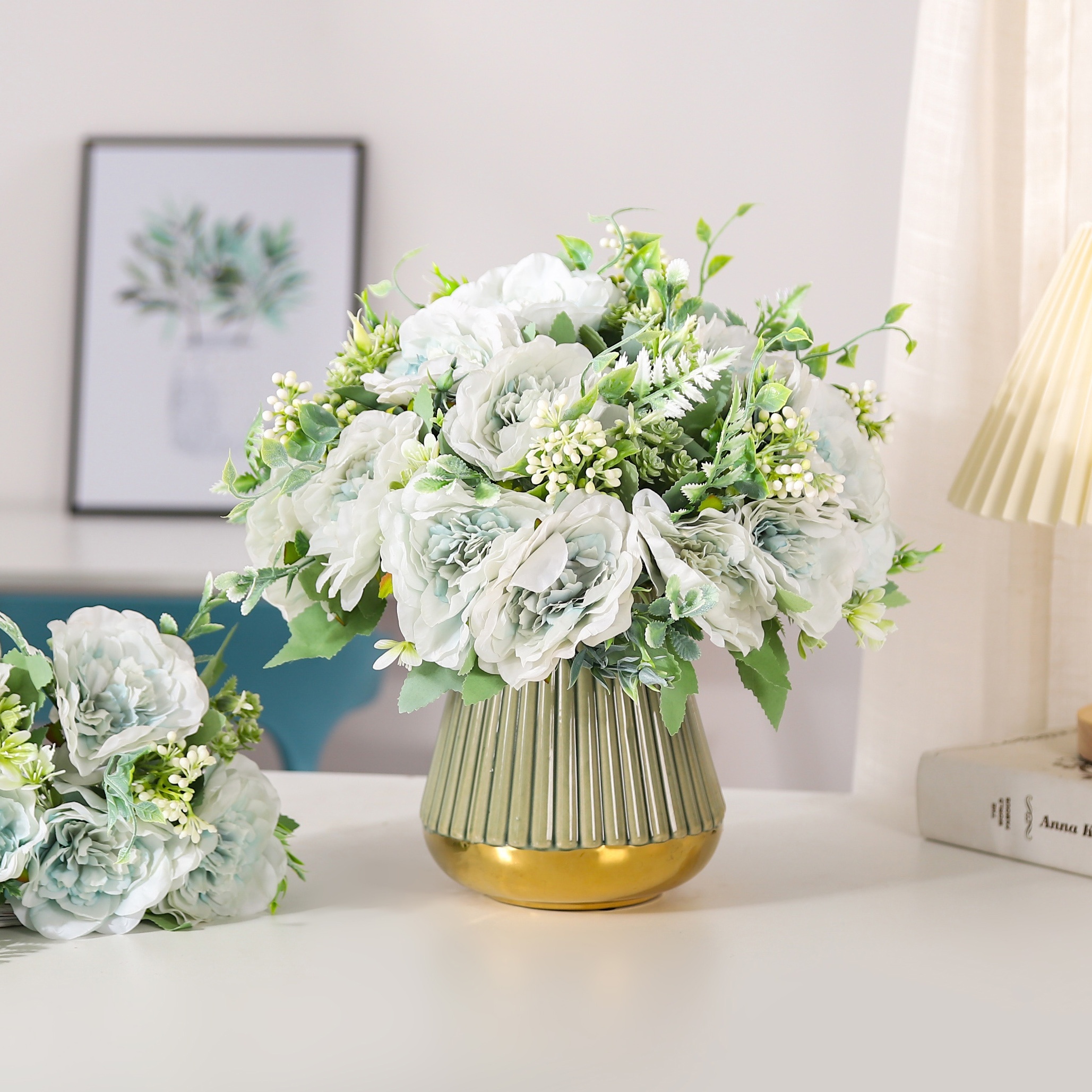 winter white artificial flowers arrangement in glass vase. Faux