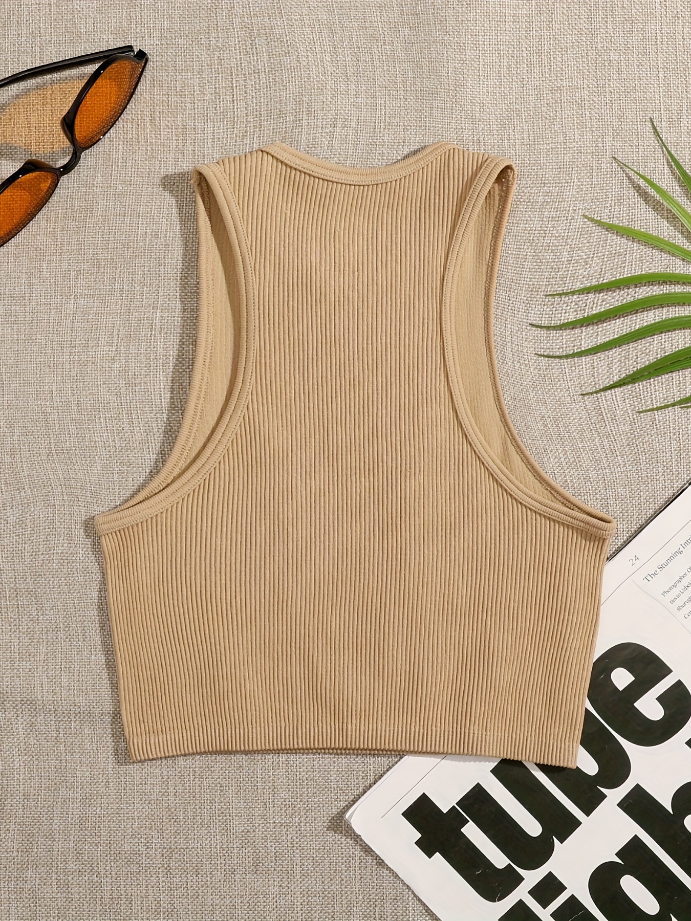 Our Rib-Knit Muscle Tank Top delivers ultimate comfort and style. This tank  hugs your muscles with its stretchy and fitted ribbed fabric