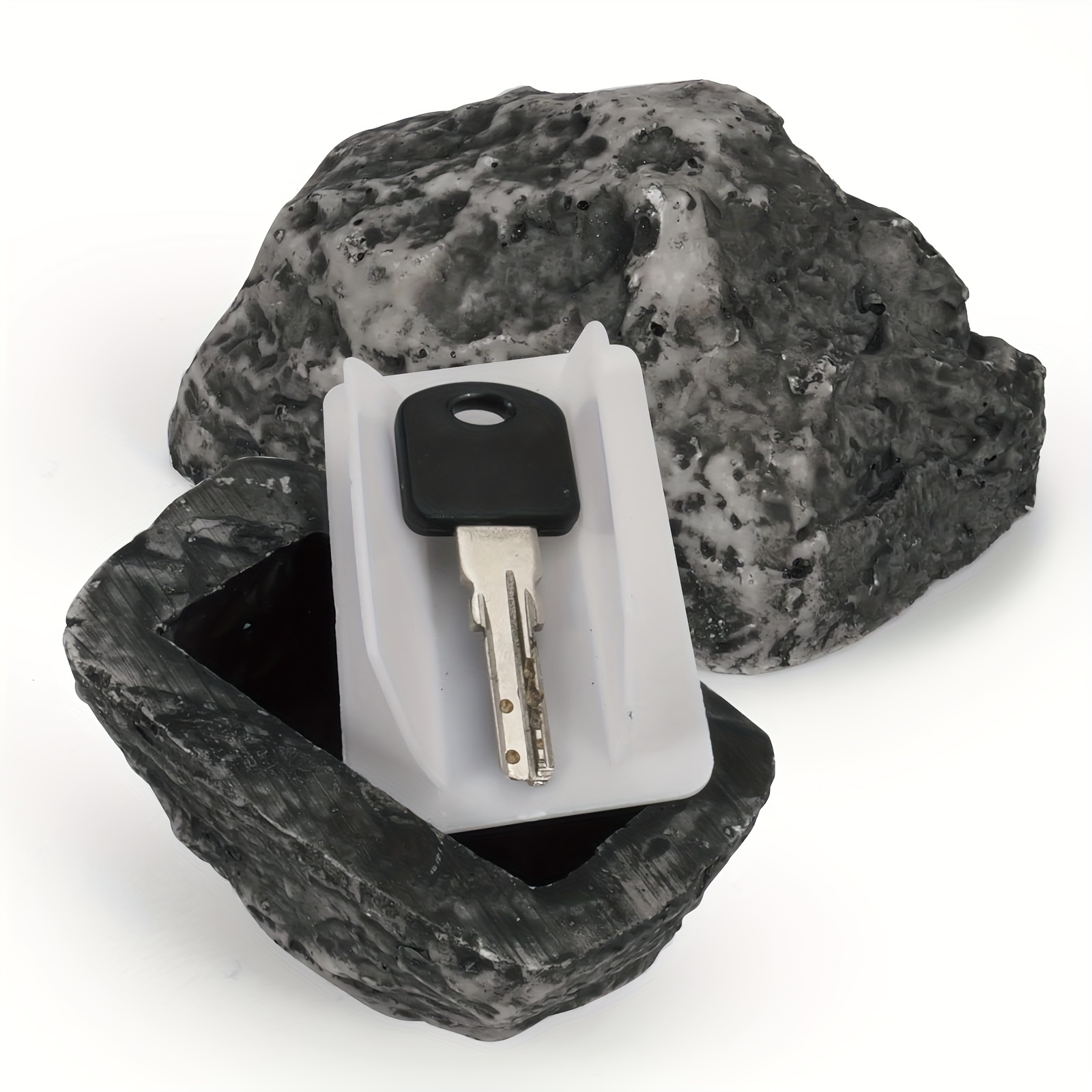 Artificial stone with secret compartment for extra key or geocaching 
