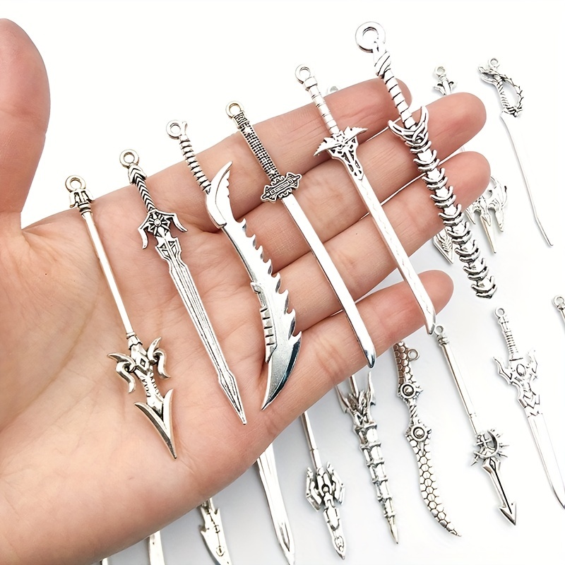 SUNNYCLUE 1 Box 24pcs Tibetan Style Sword Charms Knife Charm Medieval Antique Swords Bookmarks Miniature Weapon Alloy Charms for