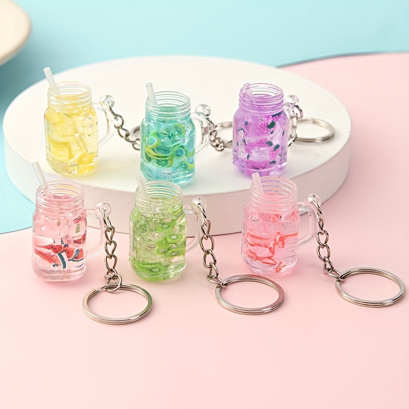 Como hacer llaveros con mini botellas\key holder with tiny bottles 