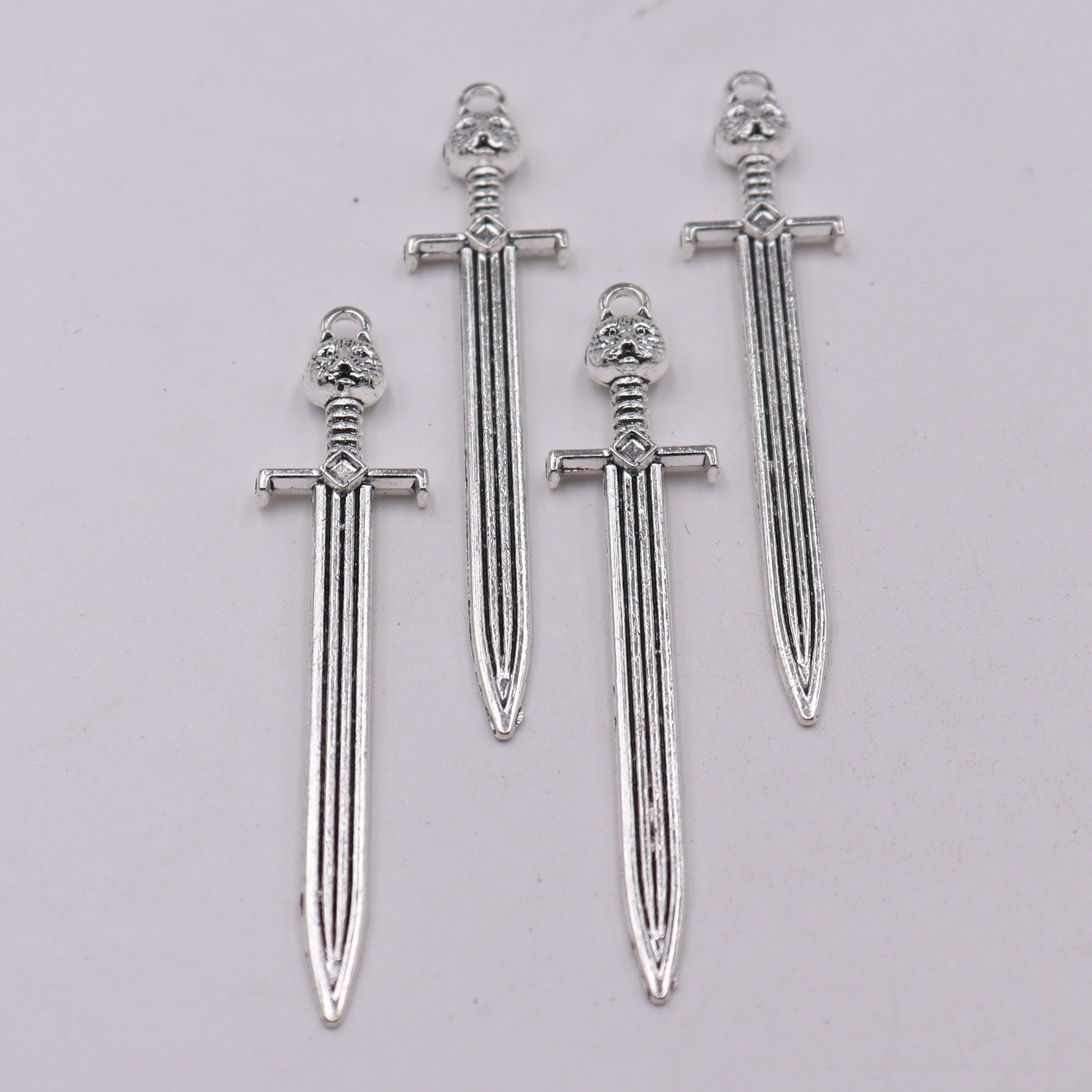 20pcs Alloy Sword Pendant Leopard Head Handle DIY Jewelry Making