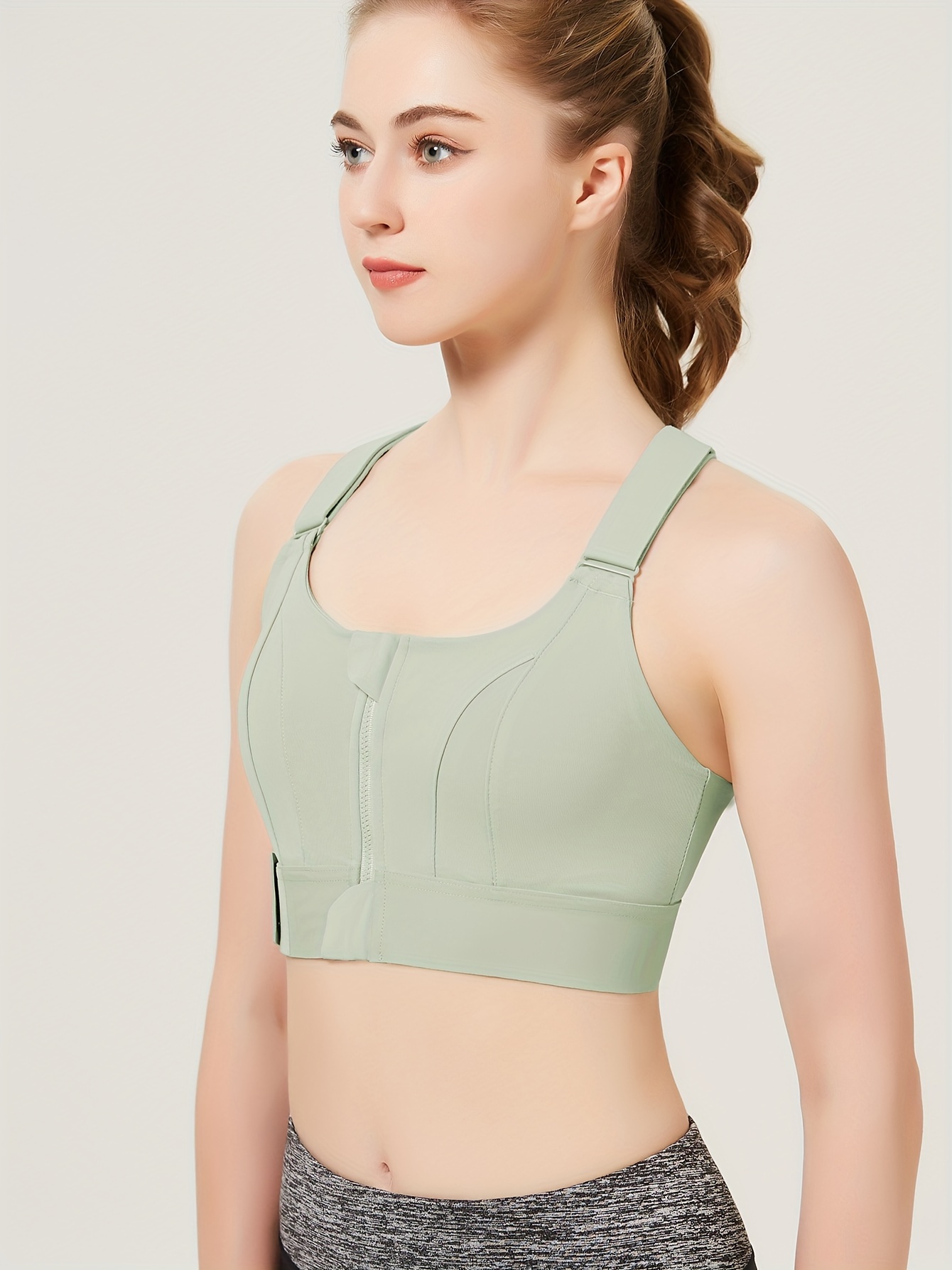 solid color shockproof sports bra zipper front round neck with fixed chest pads workout top womens activewear light green 2