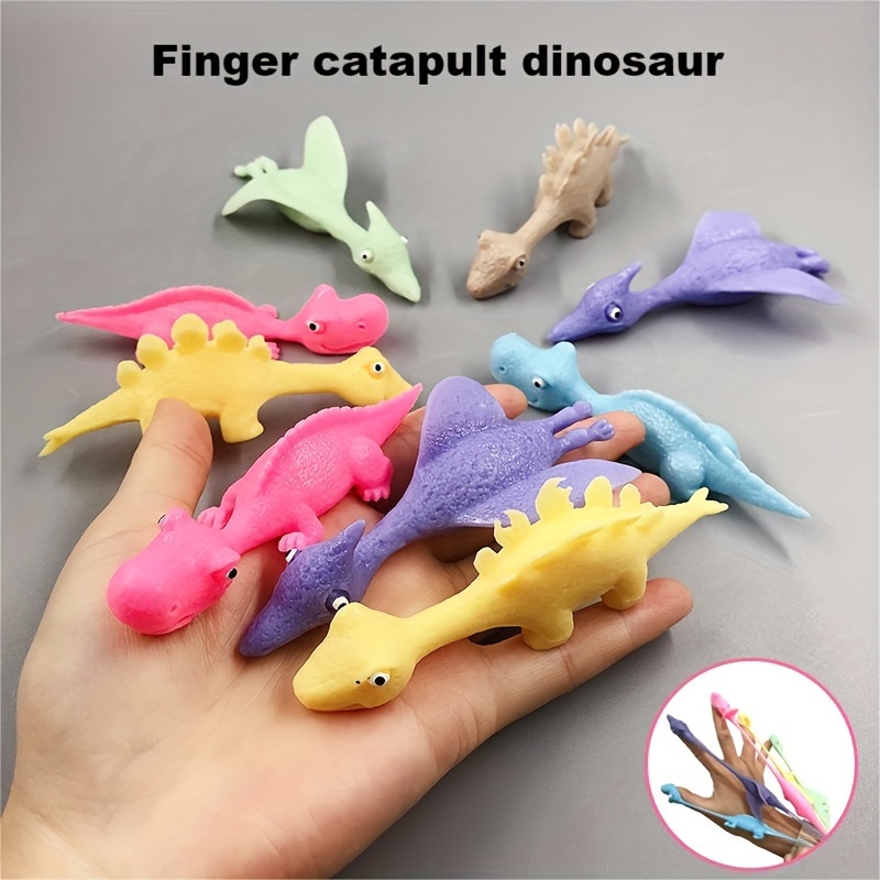 Lance-pierre de lancement de doigt de dinosaure, jouet amusant délicat,  nouveauté, matériau TPR créatif, catapulte, accessoires de décompression de  dinde, 5 pièces