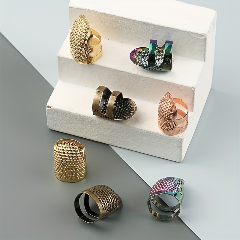 GYGYL - 4 dedales de metal de cobre para coser, protector de dedo de dedal,  accesorios para herramientas de costura (2 tamaños, S/M)