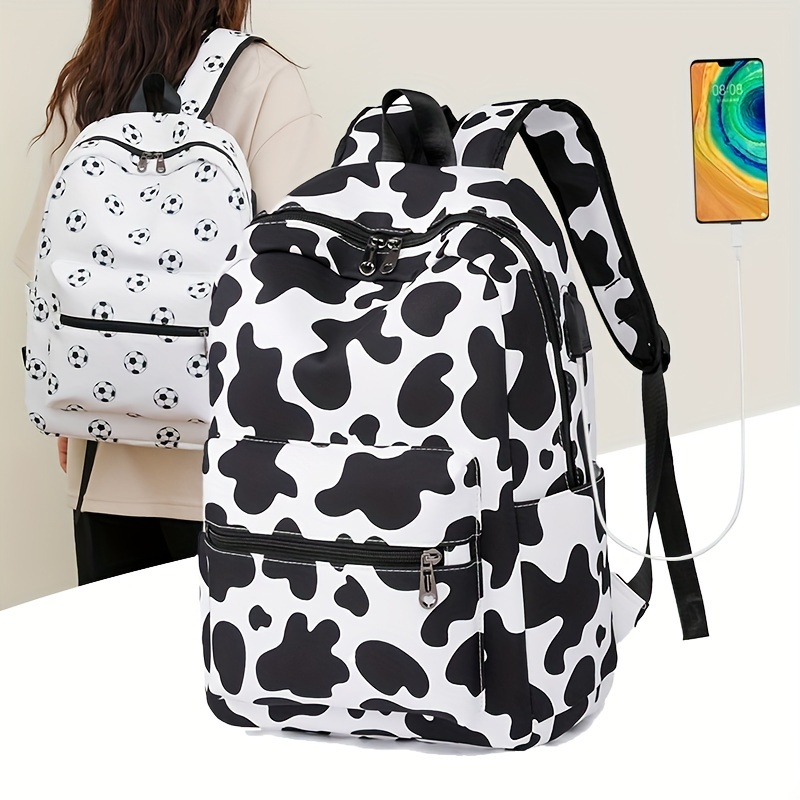 cow print - blue Backpack by K.apchi