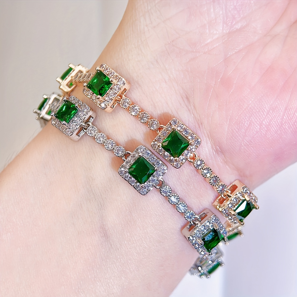 A Beautiful Green Cubic Zirconia Bracelet with a Silvery Golden Fashion Square Charm, Perfect for Women'S Evening Wear