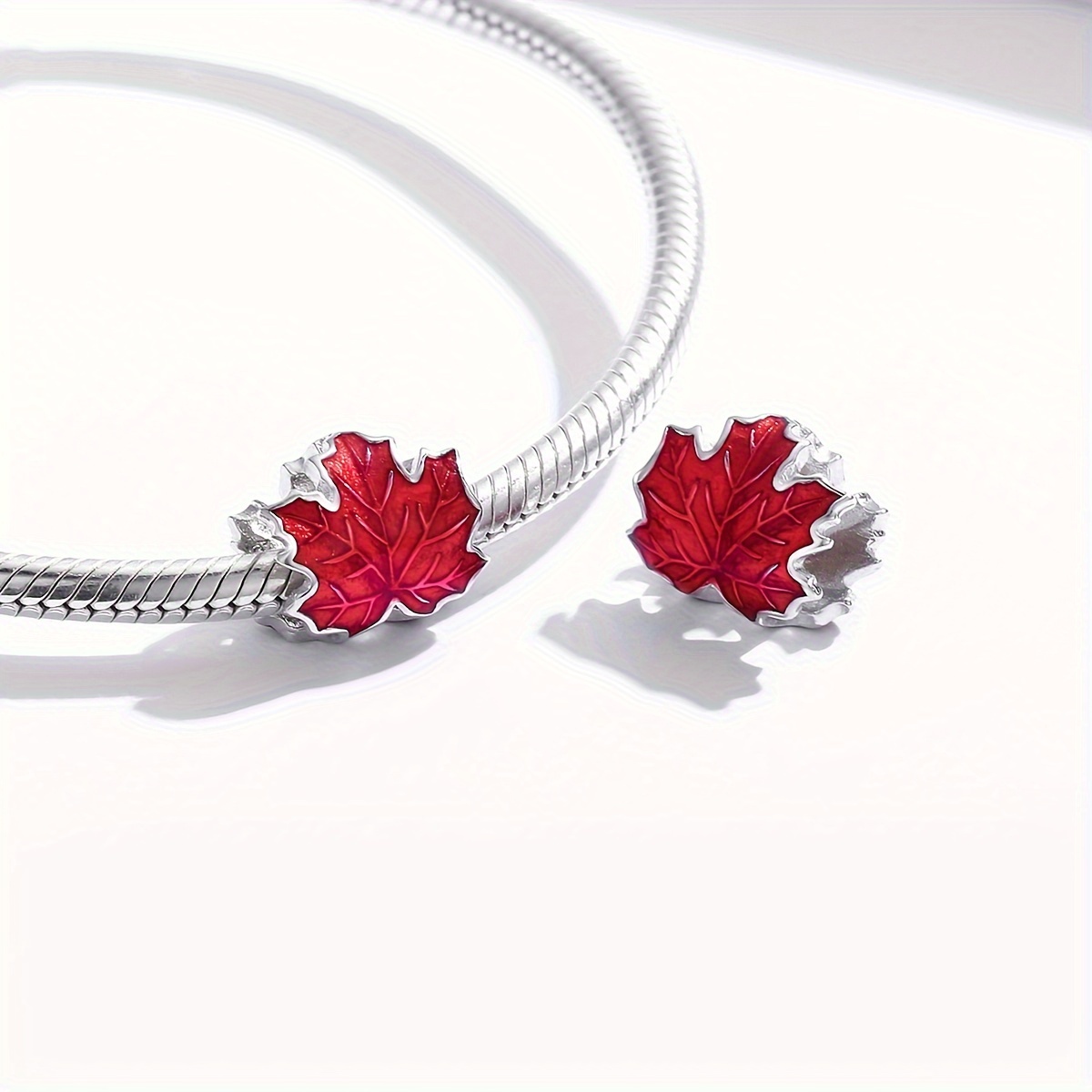 Sterling silver maple leaf on sale charm